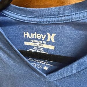 Men’s medium Hurley blue shirt.